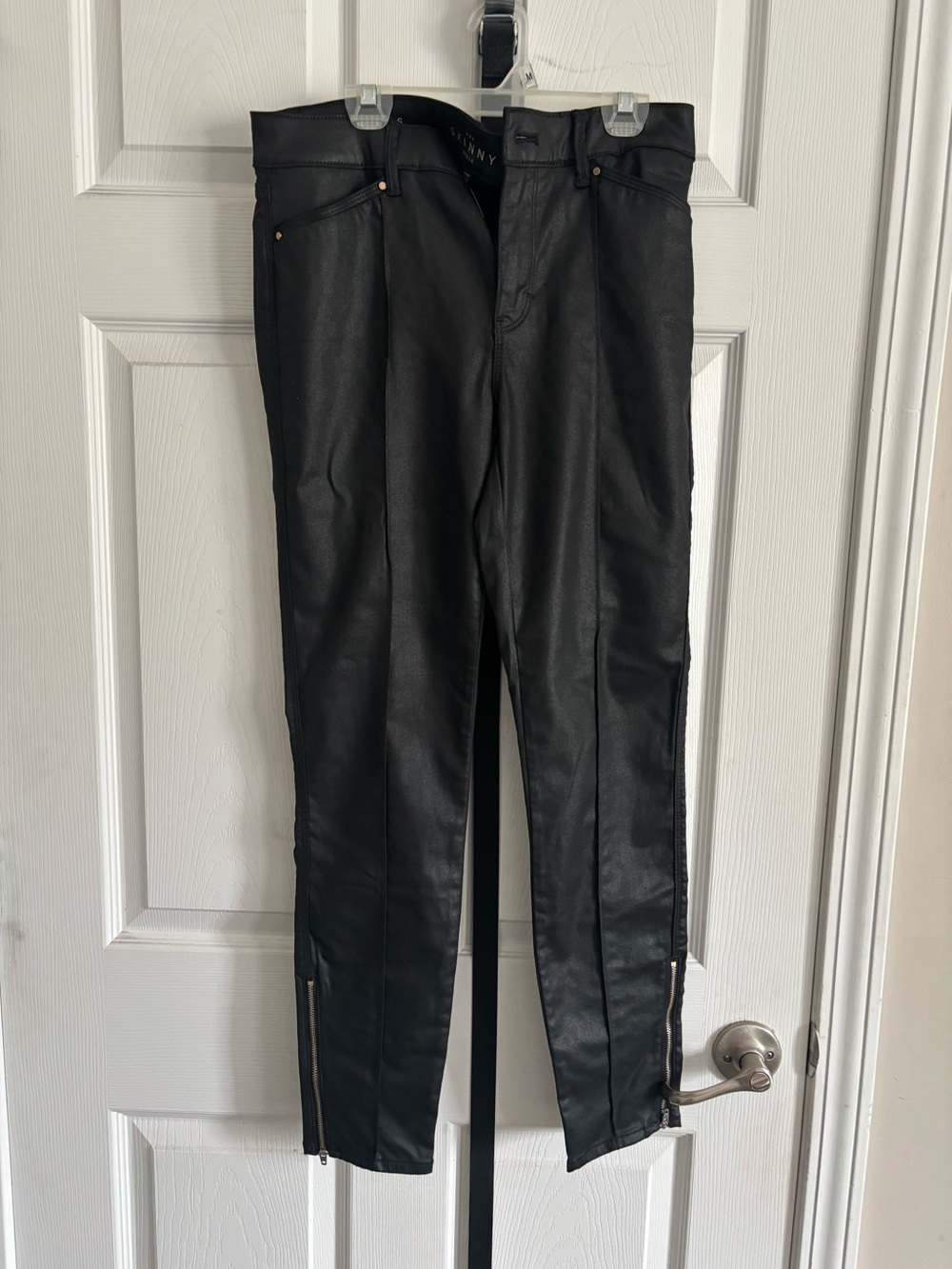 Women’s black coated skinny jean
